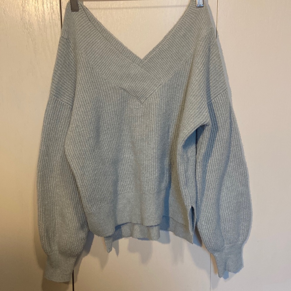 light blue sweater